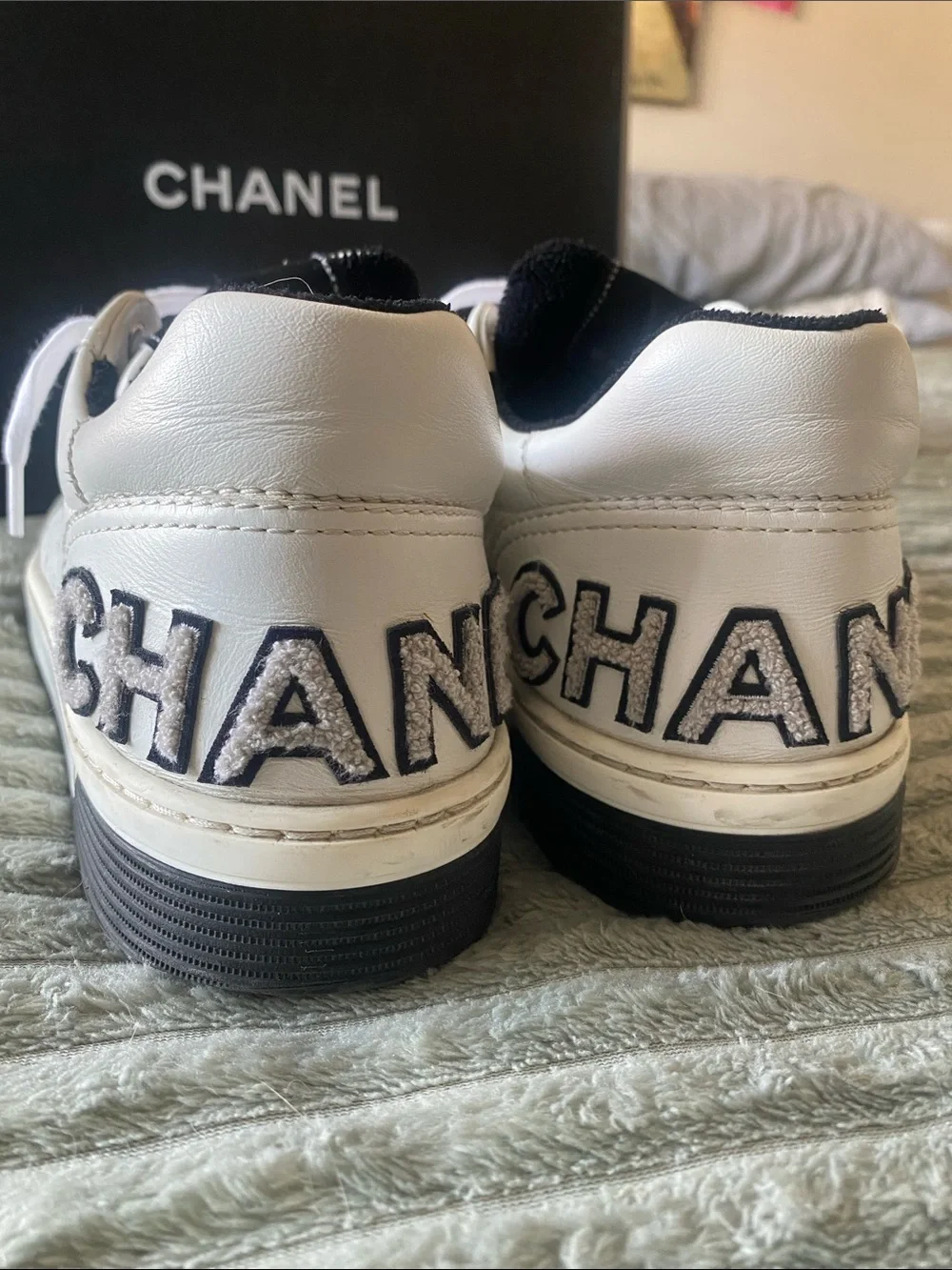 CHANEL White Leather Womens Low-Top Sneakers with Black Accents